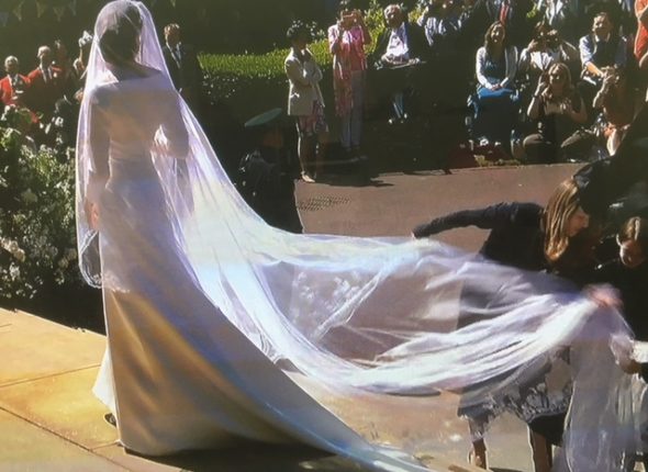 First glimpse at Meghan Markle now Duchess of Sussex Givenchy wedding dress designed by Claire White Keller The Bridge MAG. Image